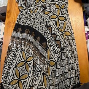 I’m selling a gray black and brown dress missing buttons at the top